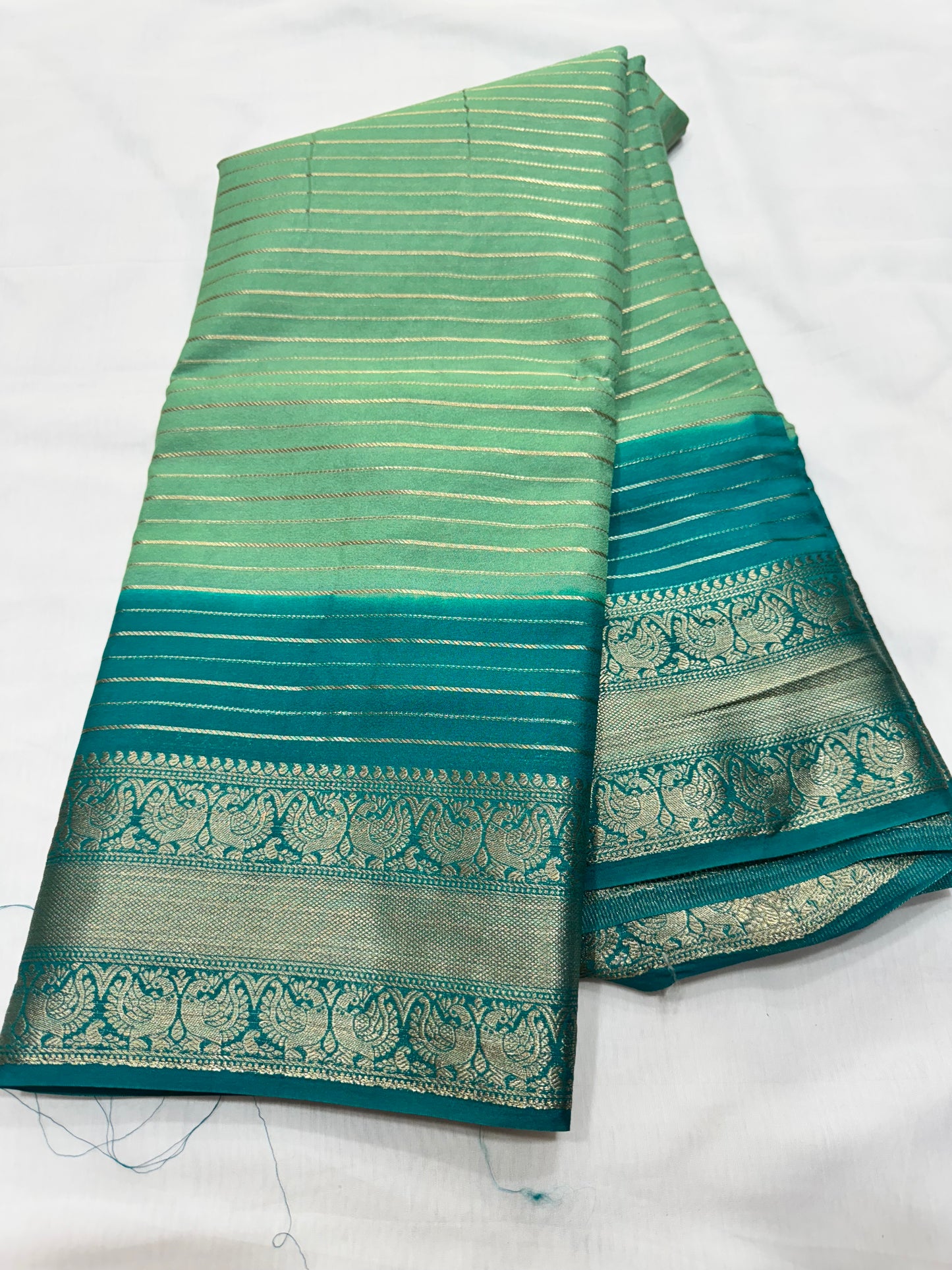 M crape Stripes with peacock design