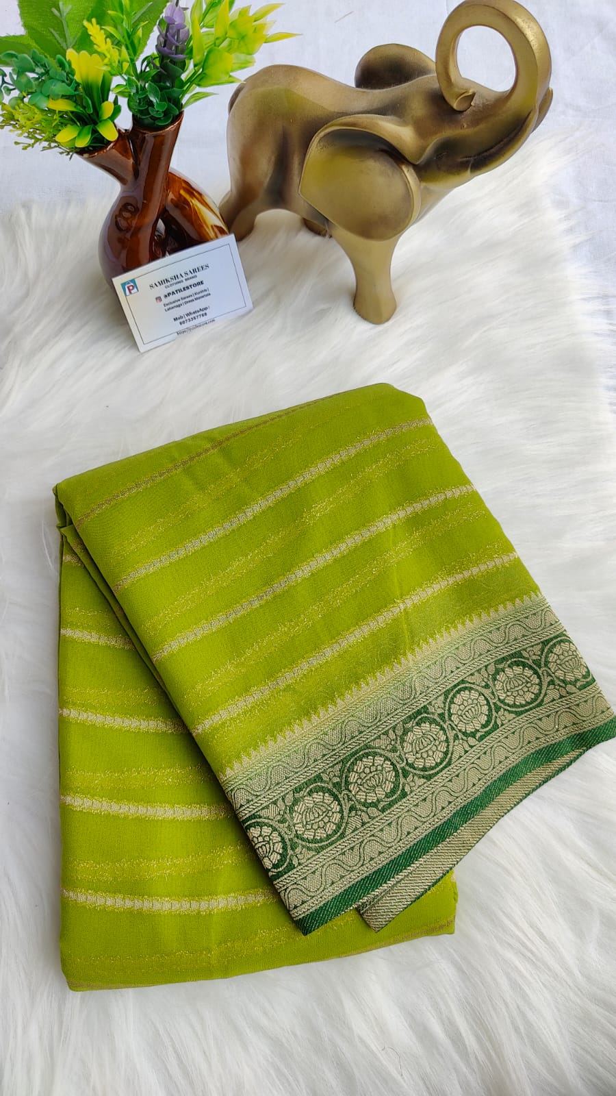 Primium Banarasi semi khadi georgatte saree green colour